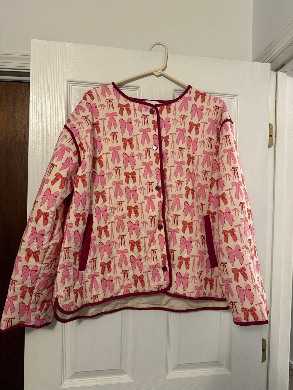 Bow over coat